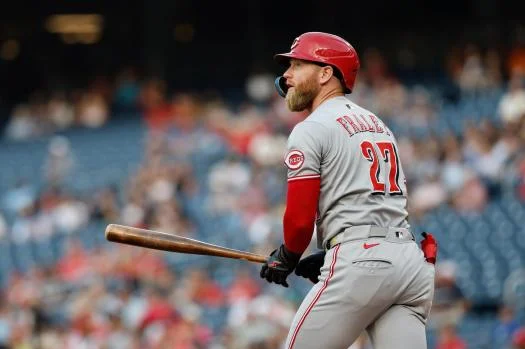FILE – Cincinnati Reds’ Jake Fraley (27) fouls off a ball hit against Washington Nationals pitcher Brad Lord during the second inning of a baseball game, in Washington, July 22, 2025. (AP Photo/Terrance Williams, File)