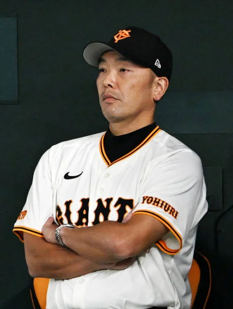 Head coach Shinnosuke Abe of the Yomiuri Giants looks on during the Central League Climax Series Final Stage Game Three against Yokohama DeNA...