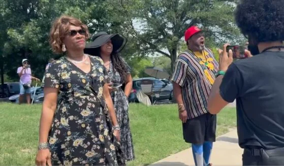Karmelo Anthony supporters yelled at a lone demonstrator outside the Texas courthouse where Anthony's murder trial is being held.