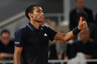 Auger-Aliassime overcomes tough test against Tien, reaches Halle quarterfinals