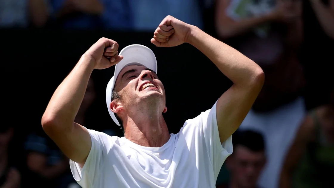 Oliver Tarvet celebrates beating Switzerland's Leandro Riedi on his Wimbledon debut