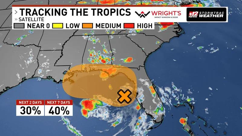 National Hurricane Center monitoring Gulf disturbance as heavy rain targets Florida. (WPEC)