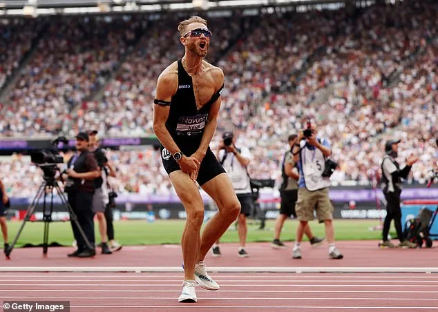 Kerr celebrates after he shattered the 27-year-old world mile record in Stratford