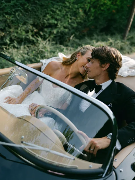 Image may contain Alex de Minaur Clothing Dress Fashion Formal Wear Gown Wedding Wedding Gown Adult and Person