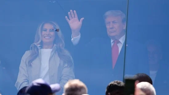 President Donald J. Trump stands with first lady Melania Trump during the World Cup final soccer match between Spain and Argentina in East Rutherford, N.J., near New York, Sunday, July 19, 2026.(AP Photo/Julio Cortez)