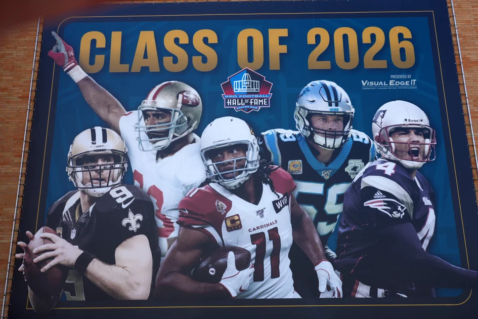 Aug 6, 2026; Canton, Ohio, USA; A banner featuring Pro Football Hall of Fame Class of 2026 enshrinees Drew Brees, Roger Craig, Larry Fitzgerald, Luke Kuechly and Adam Vinarierri. Mandatory Credit: Kirby Lee-Imagn Images
