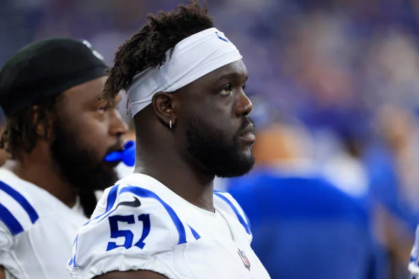 Kwity Paye of the Indianapolis Colts on the sidelines in the preseason game against the Detroit Lions at Lucas Oil Stadium on August 20, 2022 in...