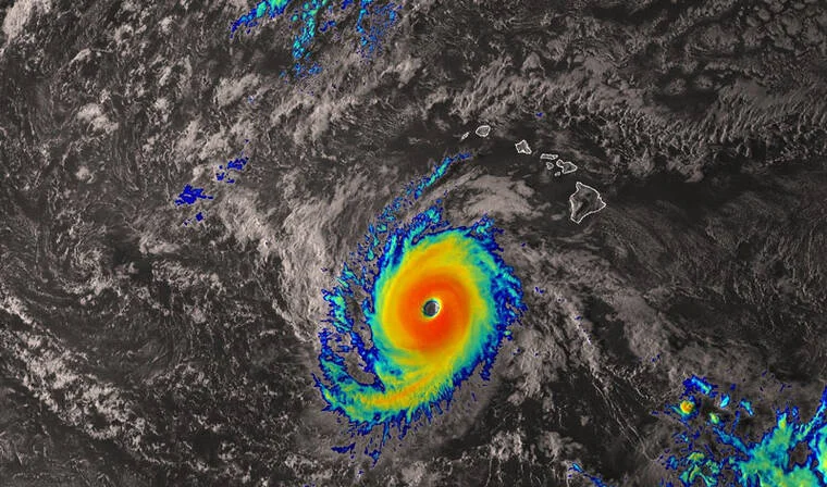 COURTESY NOAA
                                A satellite image of Hurricane Nolo passing south of the Hawaiian Islands as of 5 p.m. today.