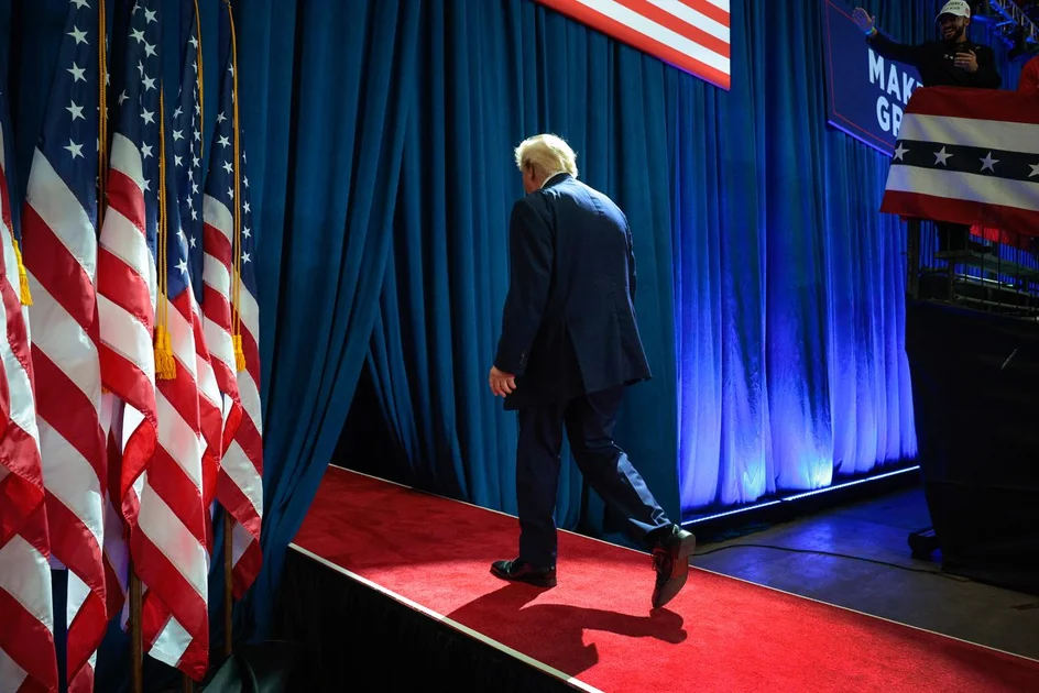 President Donald Trump leaves the stage after delivering remarks during a campaign rally at Lubbock Memorial Civic Center on October 27 in Lubbock, Texas.